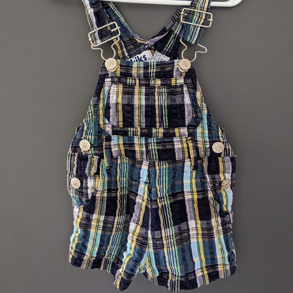 Plaid shortalls/ short overalls.